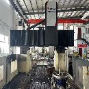 []纽威6028龙门，工作台6x2米，三轴行程6200x3200x1000，门宽2.8米，门高1.65.