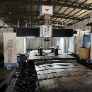 []纽威4米龙门，工作台2.5米4米，门宽3.3米，门高1.7米.